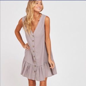 Sleeveless buttoned ruffle hem dress